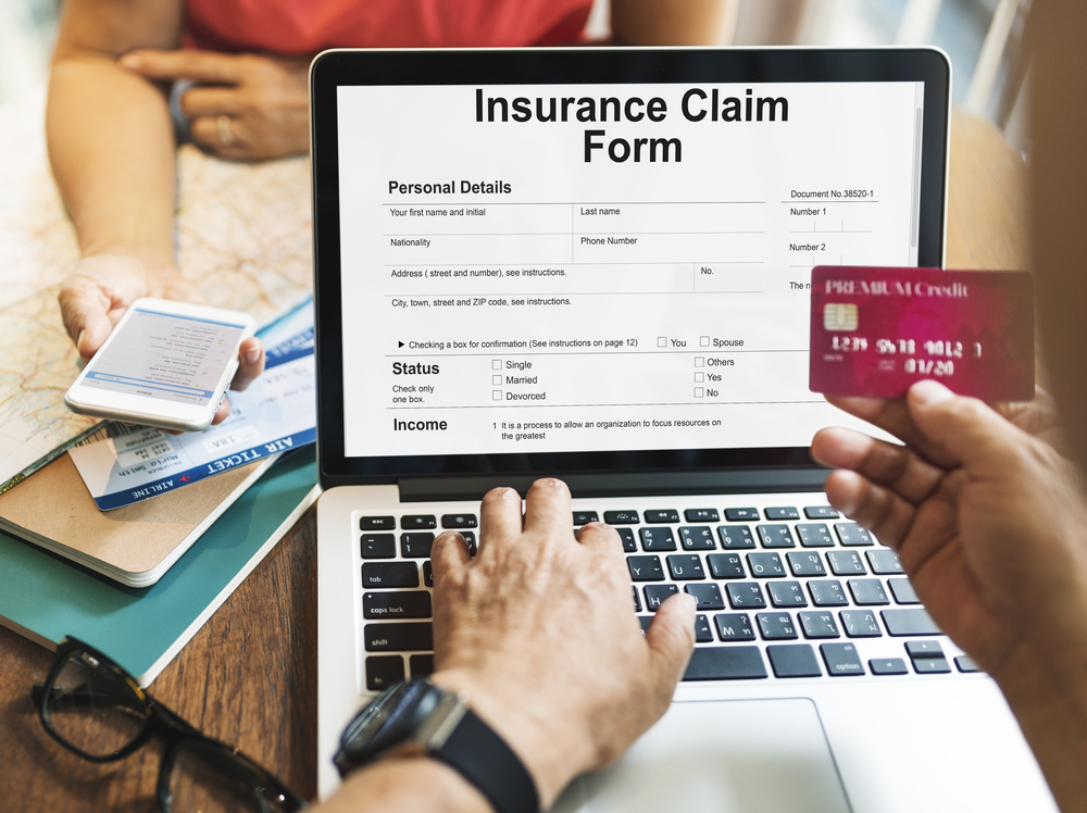 Insurance claim form on a laptop