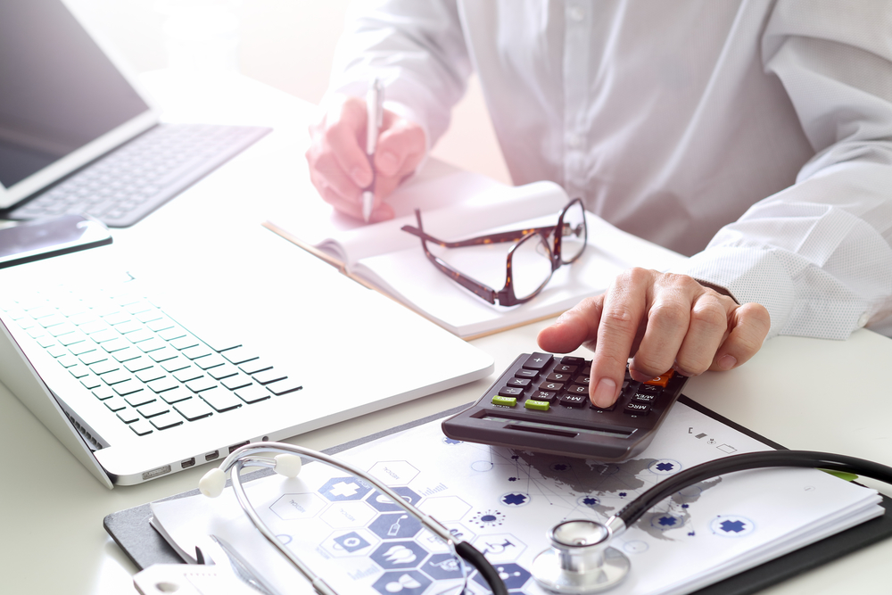 Calculator and paperwork on a desk