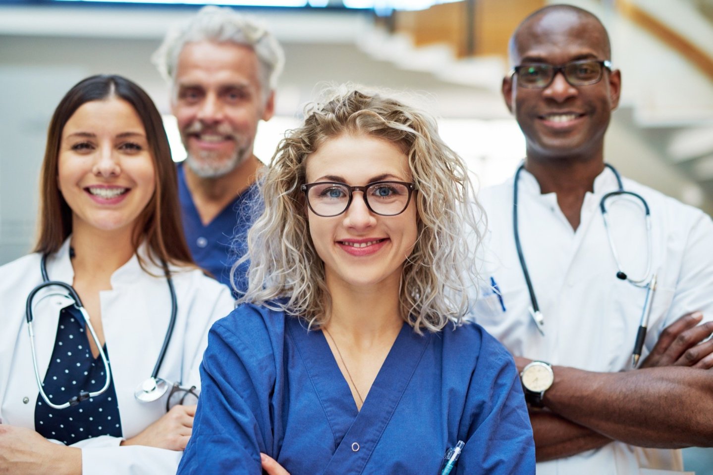 Smiling medical team in scrubs